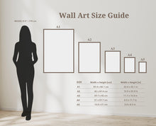 Laad de afbeelding in galerijviewer, a woman standing in front of a wall size guide
